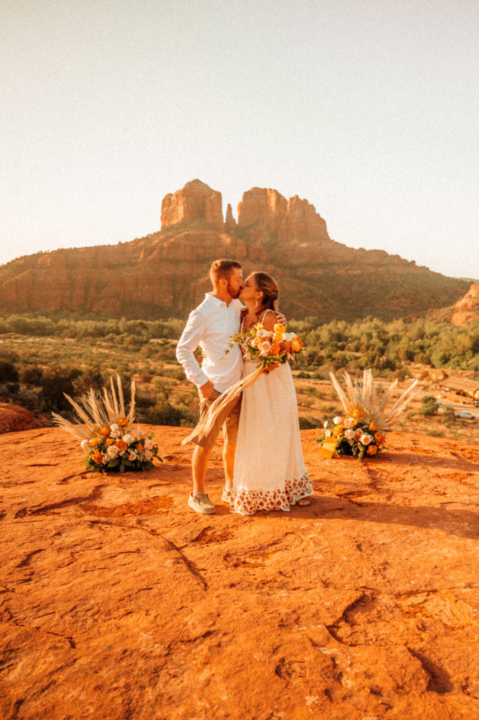 bride and groom kissing after elopement in arizona 