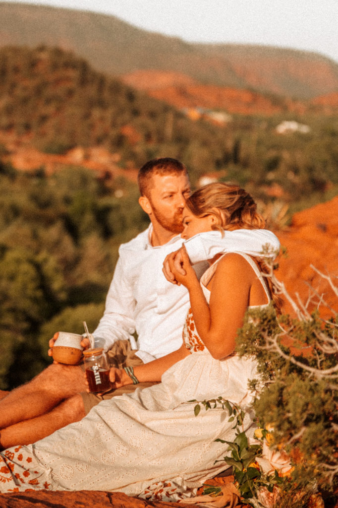 bride and groom drinking coffee after elopement in arizona
