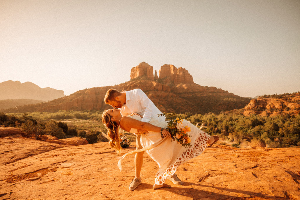 bride and groom kissing after elopement in arizona