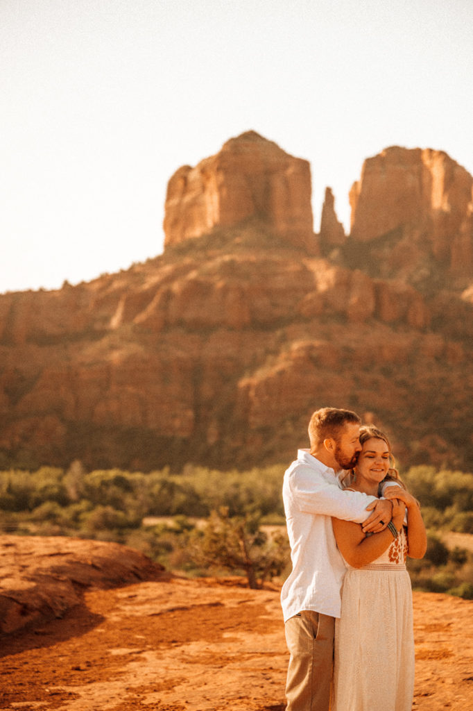 bride and groom hugging after elopement in arizona