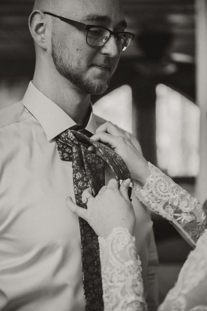 groom getting ready before elopement