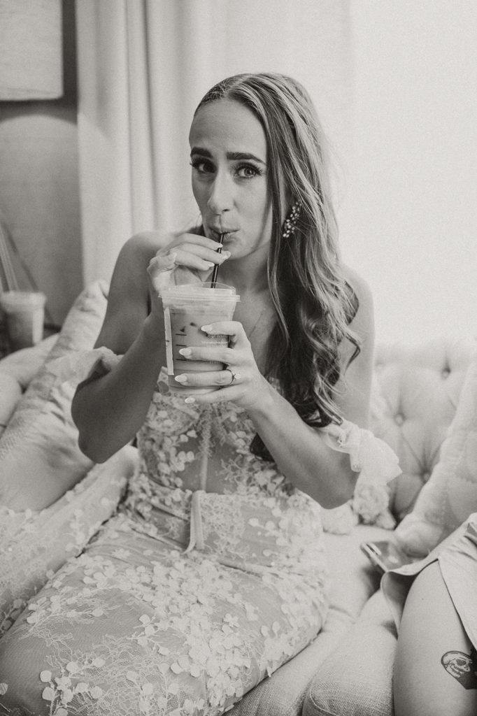 Bride drinking iced coffee