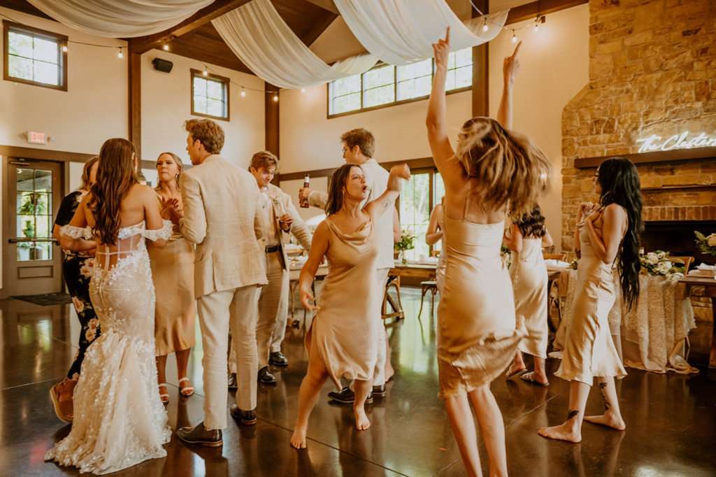 wedding guests dancing during reception
