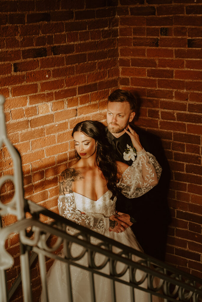 Bride and grooms moody wedding photography by Sweet Caroline Photography