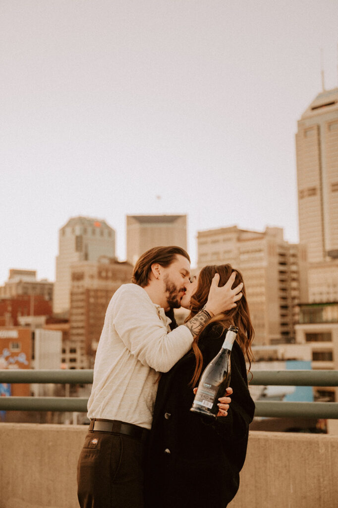 Rooftop engagement photos by photographer in Indianapolis IN - Sweet Caroline Photography