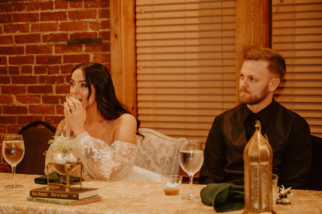 Bride and groom at sweethearts table