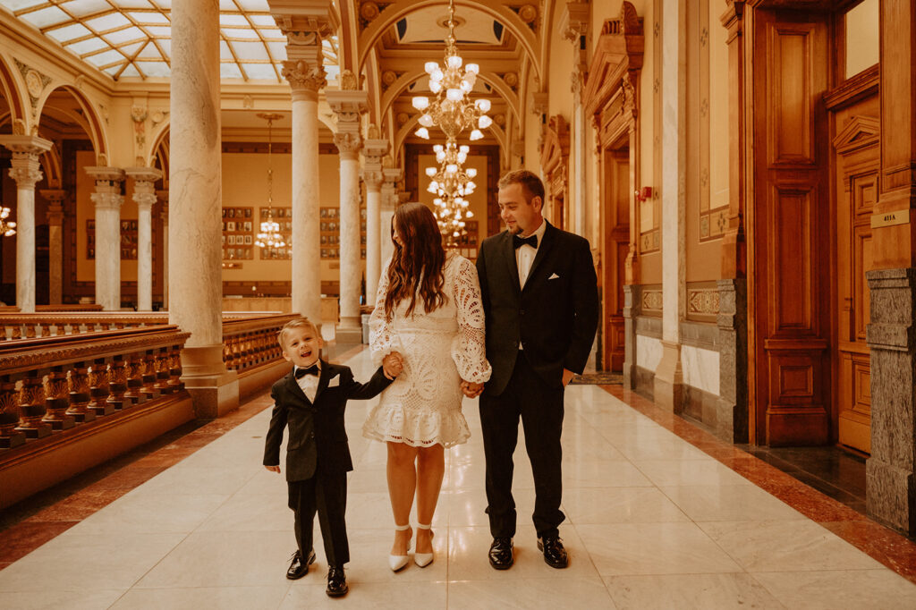 Bride and grooms wedding photos with their son